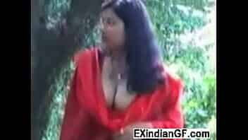 Indian bitch flashing her tits and blowing a cock